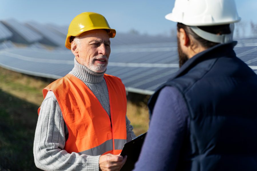 person-near-alternative-energy-plant